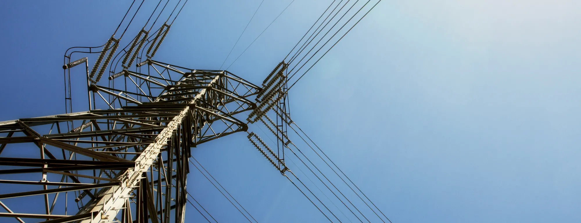 utility tower with blue sky background