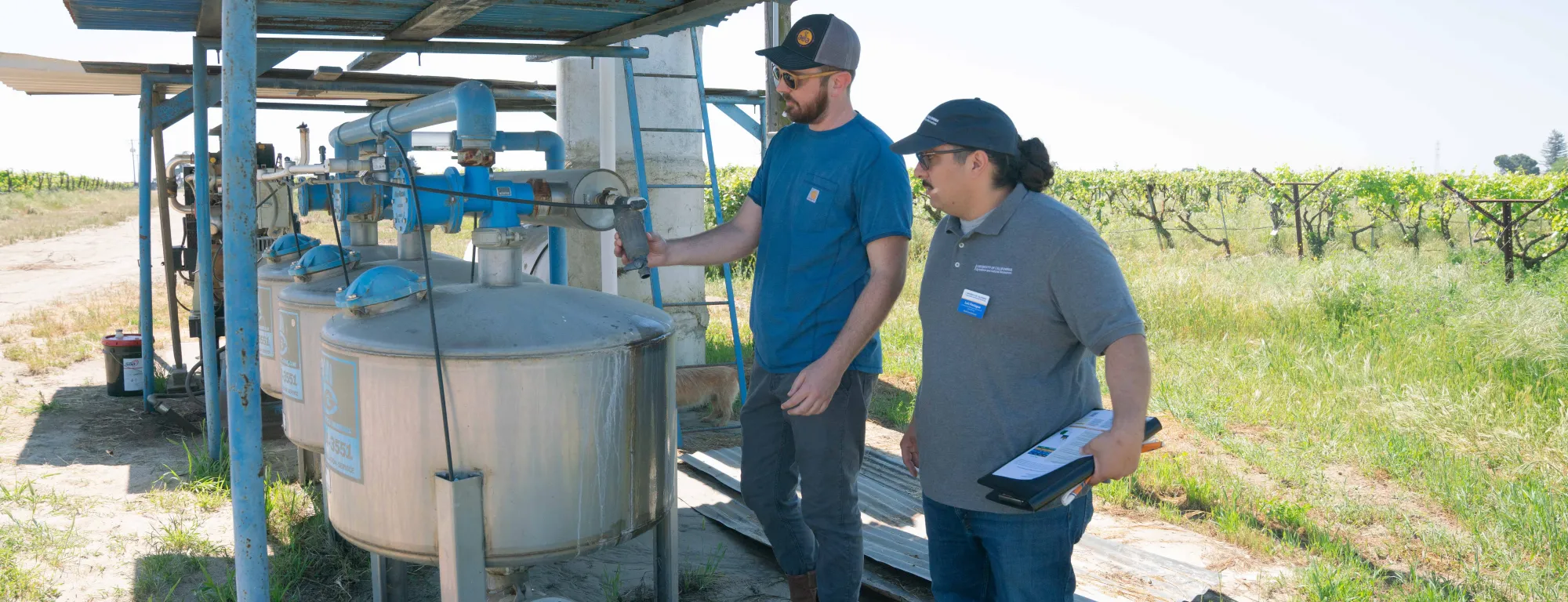UC SFN Community Education Specialist performs outreach at a farm in Fresno County