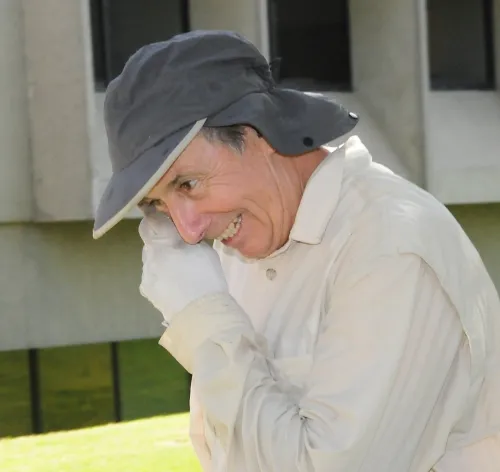 Bruce Hammock wipes water from his face. (Photo by Kathy Keatley Garvey)
