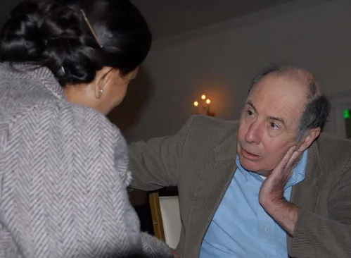 DEDICATION--Entomologist Bruce Hammock,a distinguished professor at UC Davis, confers with a researcher at a recent meeting of the Entomological Society of America. Hammock holds a joint appointment in Cancer Research with the UC Davis Medical Center. He directs the National Institute of Environmental Health Sciences (NIEHS) Superfund Program on the UC Davis campus, as well as the National Institutes of Health (NIH) Training Program in Biotechnology, and the NIEHS Combined Analytical Laboratory.(Photo by K