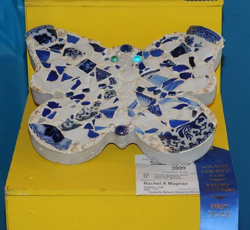 STEPPING STONE, shaped like a butterfly, draws interest at the Solano County Fair, Vallejo. This is the work of 15-year-old Rachel Magnan of Vallejo. (Photo by Kathy Keatley Garvey)