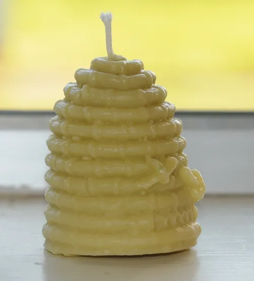 HIVE-BY SHOOTING--This is a close-up of a beehive candle made by beekeeper Elizabeth Frost. (Photo by Kathy Keatley Garvey)