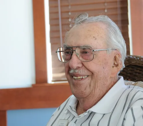 VERN BURTON, 85, relaxes at his home in Davis. He worked in the University of California system for 38 years. (Photo by Kathy Keatley Garvey)