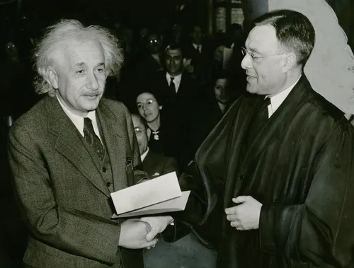 GERMAN-BORN physicist Albert Einstein (left), shown here accepting American citizenship in 1940, never said “If the bee disappears from the surface of the earth, man would have not more than four years to live," his biographers say. At right is Judge Phillip Forman. (Photo Courtesy of Wikipedia Commons)