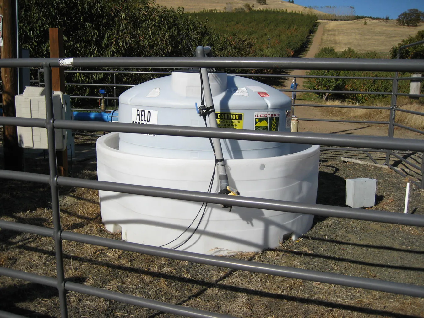 Storage tank for chemicals injected through the microirrigation system Photo: L. Schwankl