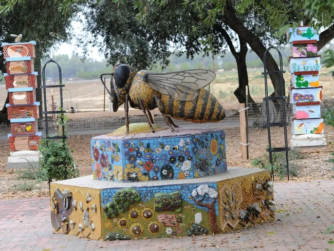 It's not visible in this photo, but there's a stink bug on the left antenna of the "Miss Bee Haven" sculpture created by Donna Billick of Davis. (Photo by Kathy Keatley Garvey)