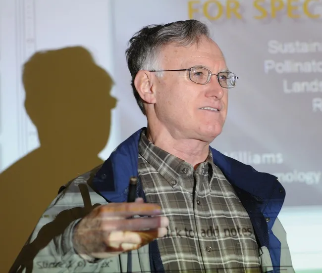 Extension apiculturist Eric Mussen answers questions from a Woodland crowd. (Photo by Kathy Keatley Garvey)