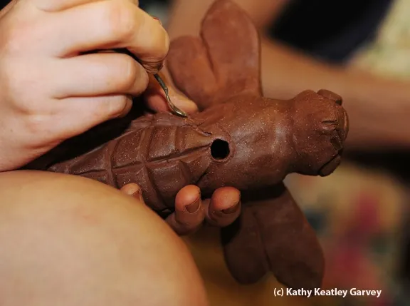 Special tools are used. The hole is for a metal rod. (Photo by Kathy Keatley Garvey)