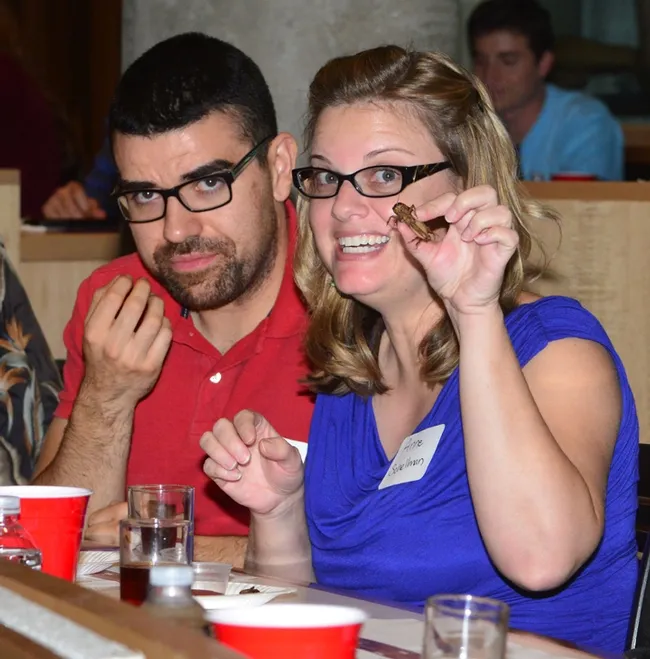 Javier Miramontes and Anne Schellman played with their food, a Cambodian cricket.