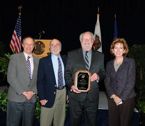 From left are Provost and Executive Vice Chancellor Ralph Hexter; emcee Bill Rains; Robbin Thorp, distinguished emeritus professor; and Chancellor Linda P. B. Katehi. (Photo by Kathy Keatley Garvey)
