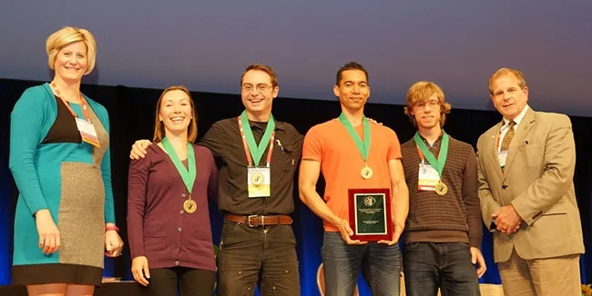 National champions: Gamesmaster Deane Jorgenson (far left) and ESA president Phil Mulder (far right) pose with the UC Davis Linnaean Games Team, who won the national ESA Linnaean Games Championship.. Members In the center are (from left) Jessica Gillung, Brendon Boudinot, captain Ralph Washington Jr., and Ziad Khouri. (Photo by Matthew Chism)