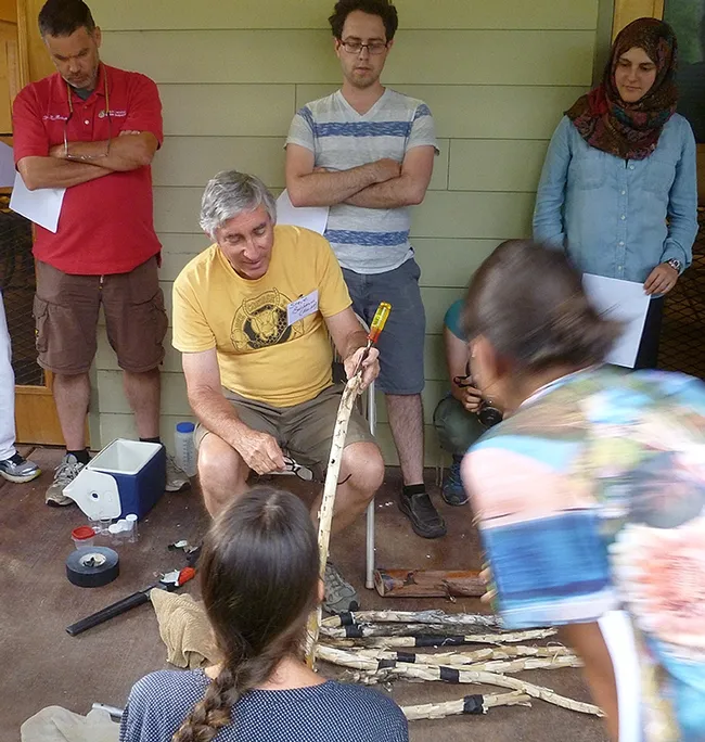 Entomologist Stephen Buchmann talks about the nests of carpenter bees at The Bee Course, an annual summer workshop in Arizona sponsored by the American Museum of Natural History. (Photo courtesy of Robbin Thorp)