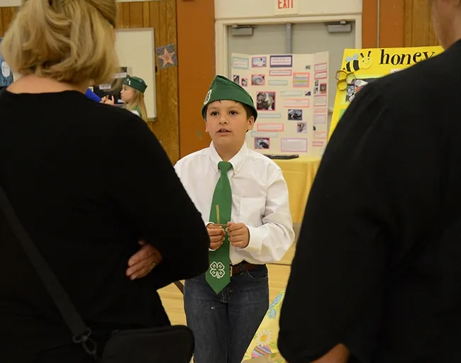 Beekeeper Nathaniel Haddon fielding questions about bees. (Photo by Kathy Keatley Garvey)