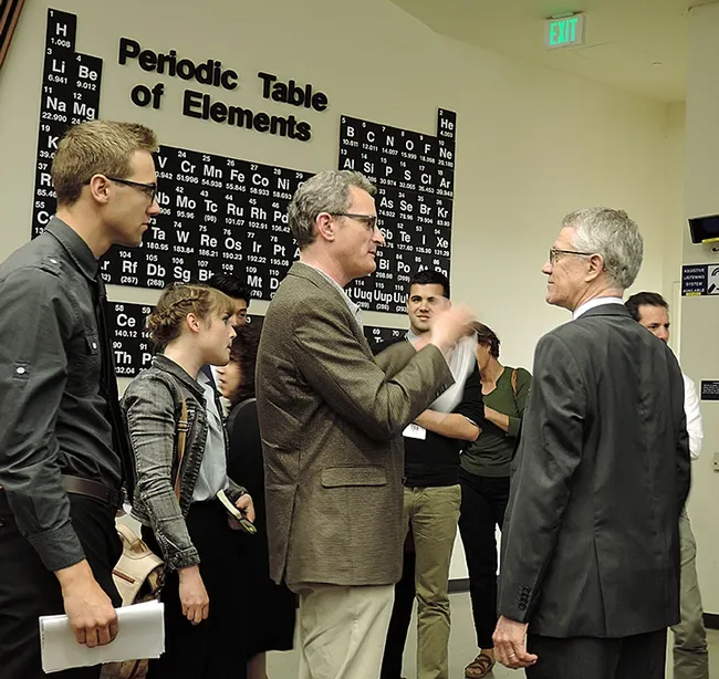 Professor Walter Leal (center right) answers questions following the symposium. (Photo by Kathy Keatley Garvey)