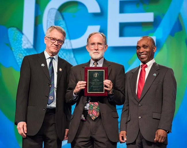 Nobel Laureate Peter Agre (center), a keynote speaker at ICE 2016, is flanked by the ICE 2016 co-chairs, Walter Leal (left) of UC Davis, and Alvin Simmons of the USDA/ARS, based in Charleston, S.C.
