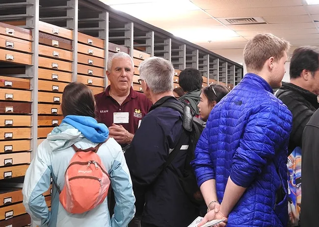 Entomologist Jeff Smith (center), who curates the butterfly and moth collections at the Bohart Museum of Entomology, answers questions.(Photo by Kathy Keatley Garvey)