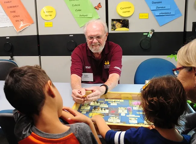 Robbin Thorp, UC Davis distinguished emeritus professor of entomology, displays a male Valley carpenter bee, aka "teddy bear." He assured visitors: "Boy bees can't sting."