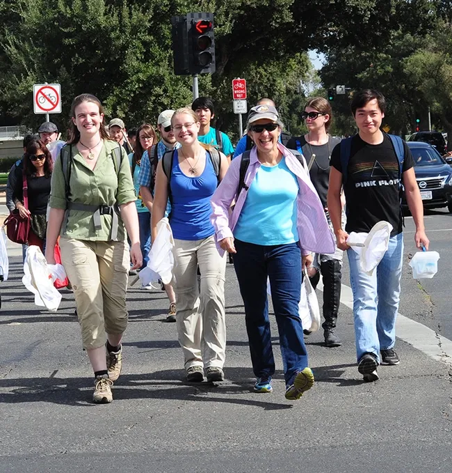 Lynn Kimsey (third from left), director of the Bohart Museum of Entomology and professor of entomology at UC Davis, leading a field trip to collect insects on the Student Farm. (Photo by Kathy Keatley Garvey)