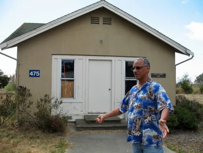UC ANR urban entomologist Vernard Lewis stands by his Villa Termiti, built just for termite research. (UC ANR Photo)