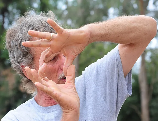 Beekeeper-scientist Randy Oliver of Grass Valley gestures during his presentation. (Photo by Kathy Keatley Garvey)