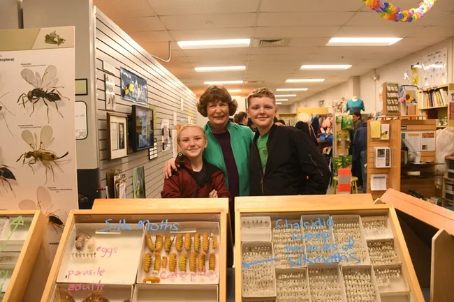 Kathy Ruiz of Davis, a member of the Yolo County Master Gardeners, visited the Bohart Museum with her grandsons Elliott Bren (left), 12, and Liam Bren, 14, of Sacramento. (Photo by Kathy Keatley Garvey)