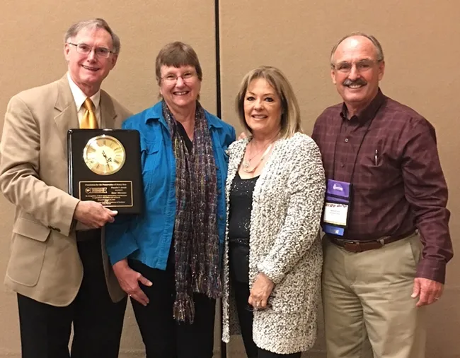 Eric and Helen Mussen (at left) of Davis with Gene and Christine Brandi of Los Banos at the American Beekeeping Federation conference in Reno. Gene Brandi presented Eric Mussen with the Founders' Award from the Foundation for the Preservation of Honey Bees.