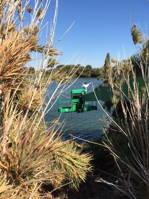 Figure 2. Chemical application by aerial lift.