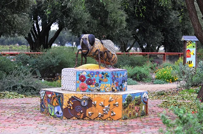 This is Miss Bee Haven, a mosaic-ceramic sculpture that anchors Haagen-Dazs Honey Bee Haven. It is the work of self-described "rock artist" Donna Billick of Davis. (Photo by Kathy Keatley Garvey)