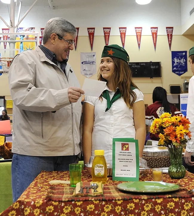 Back in 2012, beekeeper Mikayla Hagan of the Rio Vista 4-H Club talked about her beekeeping project with then Mike Reagan, member of the Solano County Board of Supervisors. She won a showmanship award at the Solano County 4-H Project Skills Day. (Photo by Kathy Keatley Garvey)