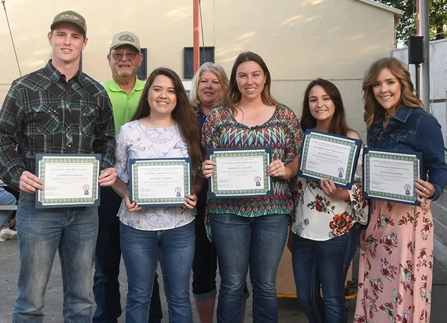 Six college scholarship winners received a total of $11,250 from the Friends of the Dixon May Fair in 2018, totaling $186,250 in college scholarships awarded since 2000. In front (from left) are Cameron Garlick of Dixon, Makala Hagan of Rio Vista, Mackenzie Davi of Dixon, Rebecca Luedke of Dixon, and Jillian Raycraft of Dixon. In back are Donnie Huffman of Vacaville, president of the Friends of the Fair, and Carrie Hamel of Dixon, scholarship chair. Not pictured is scholarship recipient Halie Pringle of V