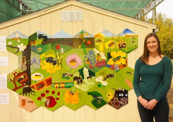 Sarah Dalrymple, then a doctoral candidate at UC Davis, coordinated the bee mural in the Häagen-Dazs Honey Bee Haven. (Photo by Kathy Keatley Garvey)