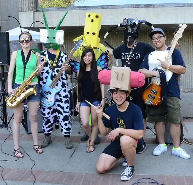 Group photo: In front is Yao Cai. The three in the second row are (from left) Jill Oberski, Brendon Boudinot and Christine Tabuloc. In back (from left) are Zachary Griebenow, Jackson Audley and Wei Lin.