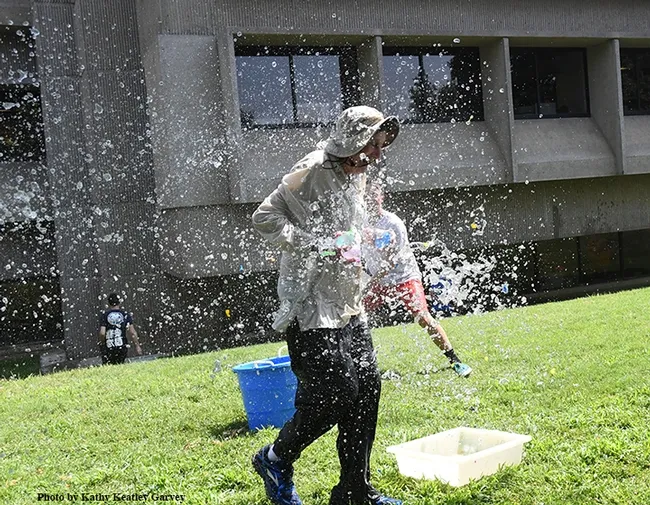 Scene 4: The water slides off of Bruce Hammock. (Photo by Kathy Keatley Garvey)