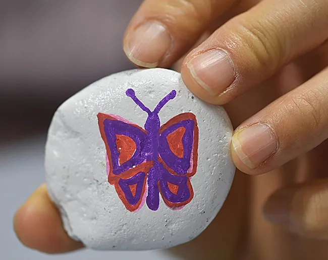 What's a rock without a butterfly on it? (Photo by Kathy Keatley Garvey)