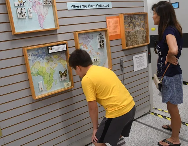 "Places where we've collected" drew the attention of these Bohart guests. (Photo by Kathy Keatley Garvey)