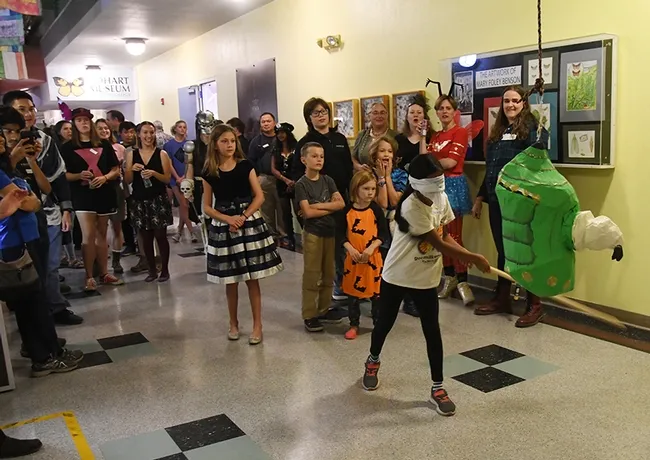 A direct hit and the crowd cheers! (Photo by Kathy Keatley Garvey)