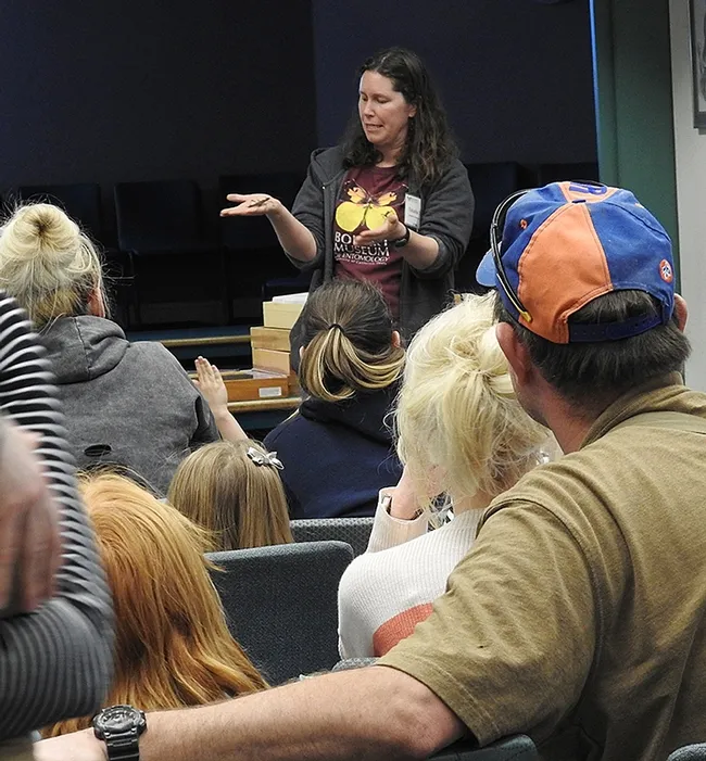 A stick insect is about to crawl up the arm of Tabatha Yang. "It thinks I'm a tree," she said. (Photo by Kathy Keatley Garvey)