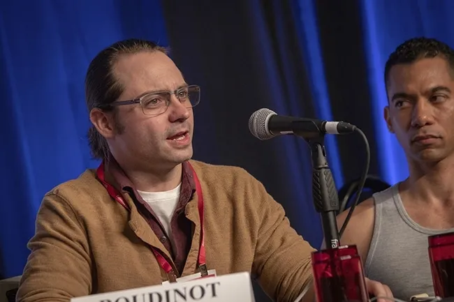 In a scene from the 2018 national Linnaean Games championships, Brendon Boudinot answers a question. Team captain Ralph Washington Jr. looks on. (ESA Photo)
