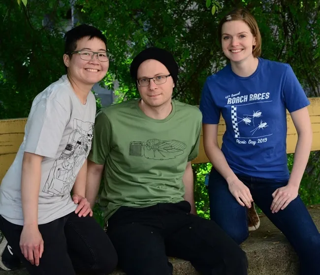 These are the new t-shirts to be offered by the Entomology Graduate Student Association on UC Davis Picnic Day. From left are artists/scientists Ivana Li, Corwin Parker and Jill Oberski. (Photo by Kathy Keatley Garvey)