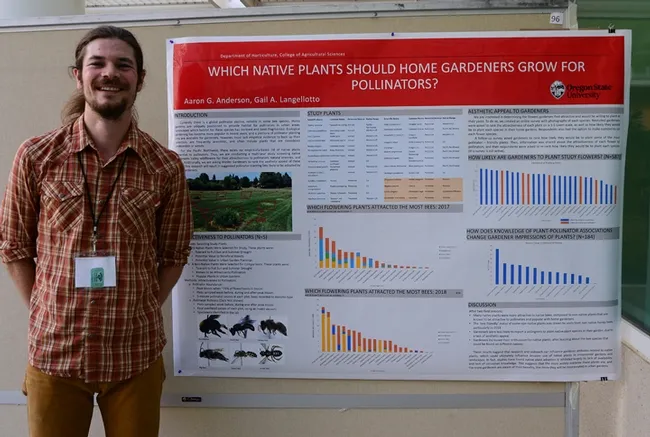 Researcher Aaron Anderson of Oregon State University stands by his poster on "Which Native Plants Should Home Gardeners Grow for Pollinators." Poster sessions are an integral part of the International Pollination Conference. (Photo by Kathy Keatley Garvey)