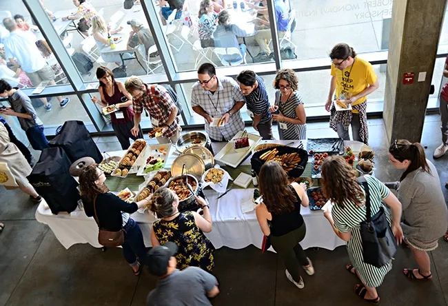 A reception for the crowd at the International Pollinator Conference. The site: the UC Davis Honey and Pollination Center, Robert Mondavi Institute. (Photo by Kathy Keatley Garvey)