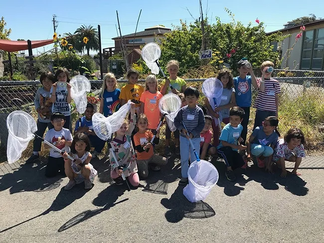 Future entomologists? A group of students in a Bay Area three-week insect class, taught by SaveNature.Org, poses for a photo.