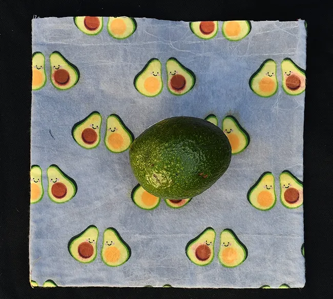 Single plastic bags and plastic wrap are out; reusable wax wrappers are in. They're used to wrap sandwiches and other foods. They are environmentally friendly, sustainable and economical. This wax wrap is the work of Vacaville artist and crafter Teresa Hickman of Vacaville ("handmadebyTeresa" on Facebook), who sells these (along with tote bags and zippered pounches) at the Davis Farmers' Markets and other venues. (Photo by Kathy Keatley Garvey)