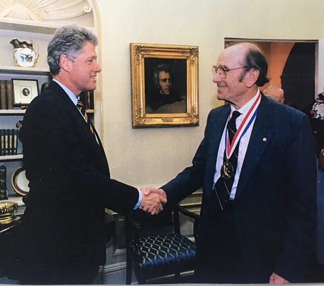 Thomas "Tom" Eisner, the father of chemical ecology, accepts his National Medal of Science award in 1994 from President Bill Clinton for his "seminal contributions in the fields of insect behavior and chemical ecology, and for his international efforts on biodiversity." (Courtesy Photo)
