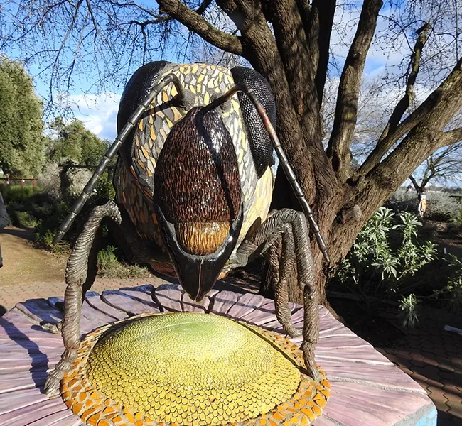 This is the ceramic-mosaic sculpture, "Miss Bee Haven," which anchors the Häagen-Dazs Honey Bee Haven on Bee Biology Road, UC Davis. It is the work of Davis-based artist Donna Billick. (Photo by Kathy Keatley Garvey)