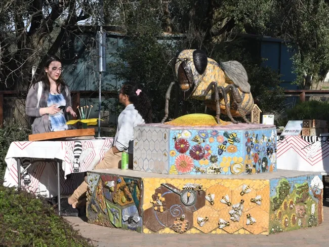 A six-foot-long worker bee, the work of self-described "rock artist" Donna Billick of Davis, anchors the Häagen-Dazs Honey Bee Haven. (Photo by Kathy Keatley Garvey)