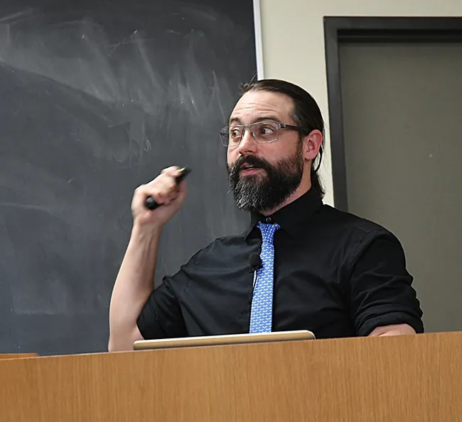 Brendon Boudinot tells the crowd we all share a common ancestor. (Photo by Kathy Keatley Garvey)
