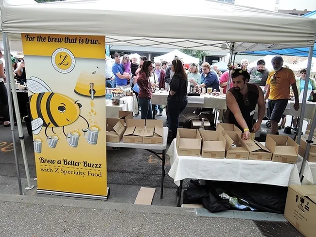Z Specialty Foods of Woodland kept busy at the first three California Honey Festivals. Now the company is offering honey "care packages." The family of Amina Harris, director of the UC Davis Honey and Pollination Center, owns and operates the business. (Photo by Kathy Keatley Garvey)