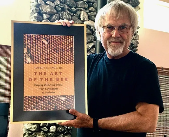 Eminent honey bee geneticist and biologist Robert E. Page Jr. with his new book, "The Art of the Bee."