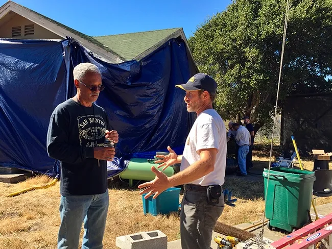In this image, taken in October 2018, consultant and mentor Vernard Lewis (left), confers with Andrew Sutherland, UC integrated pest management advisor for Bay Area counties, about the Villa Termiti at the UC Berkeley Field Station. Sutherland, who holds a doctorate in entomology from UC Davis, was recently awarded state funding to remodel the Villa for future training of pest management professionals in the state.&nbsp;(UC ANR Photo by Pam Kan-Rice)